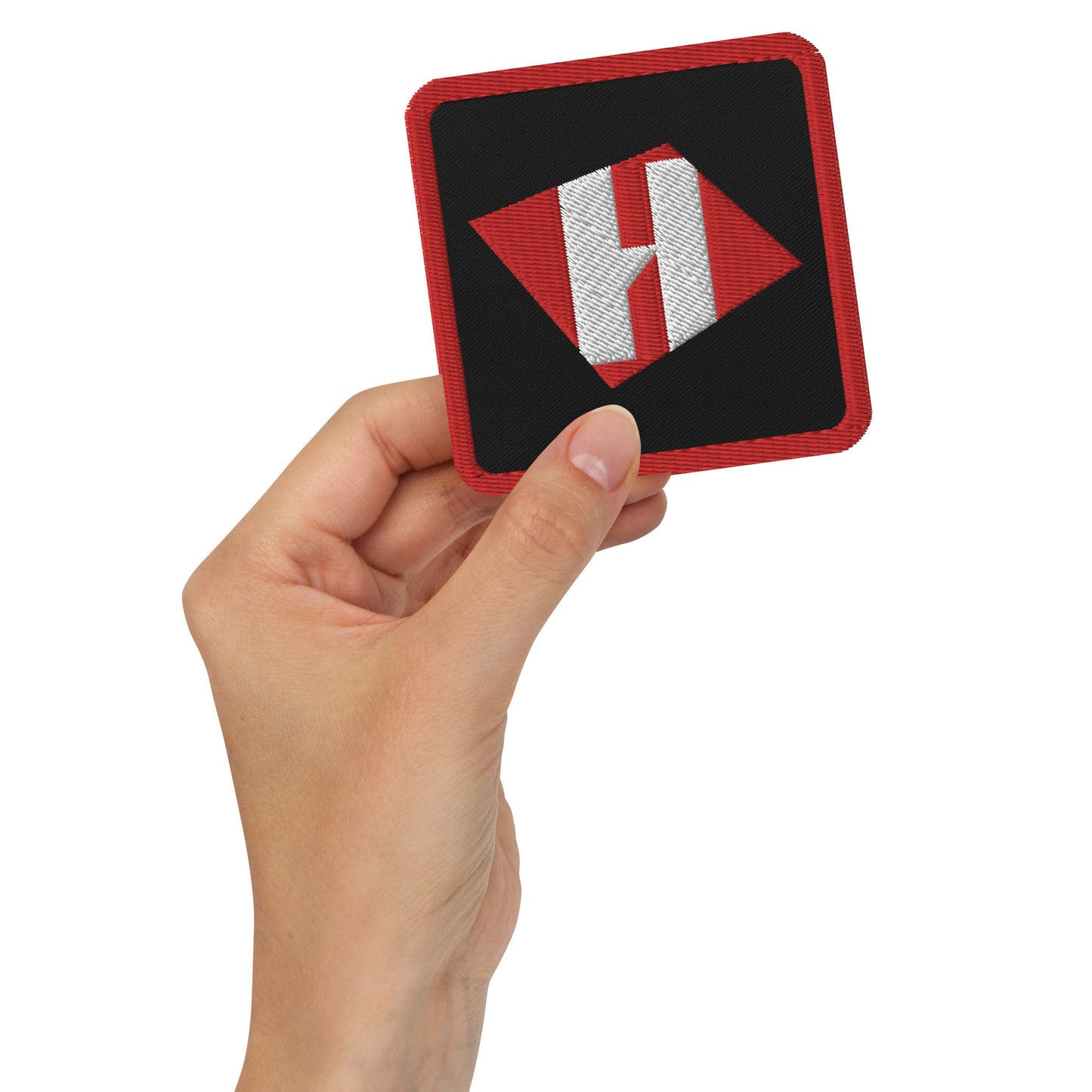 Black embroidered patch with color hache